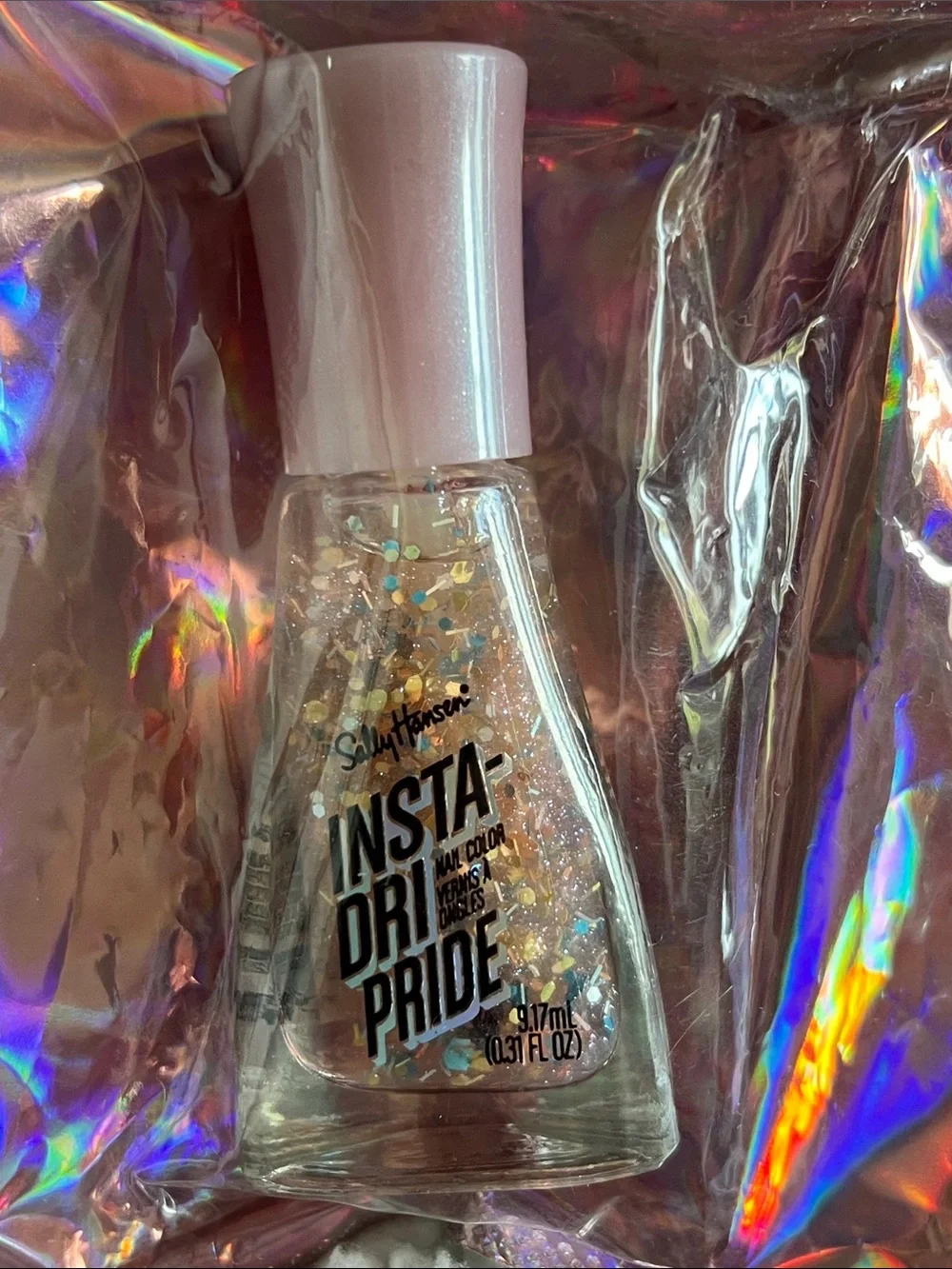 Sally Hansen Nail Polish – Yellow, Pink, Pink glitter & Fuchsia.